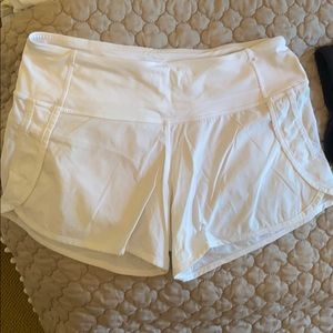 White speed up lululemon shorts 4”